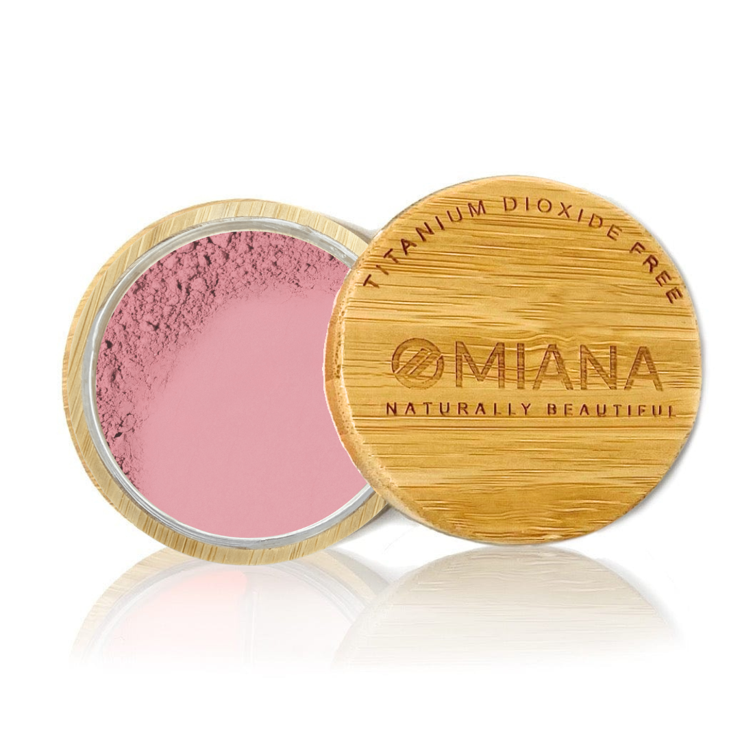 Omiana Loose Powder Mineral Blush Makeup pink in a bamboo container on a white background