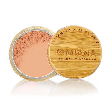 Omiana Loose Powder Mineral Blush Makeup in a bamboo container on a white background